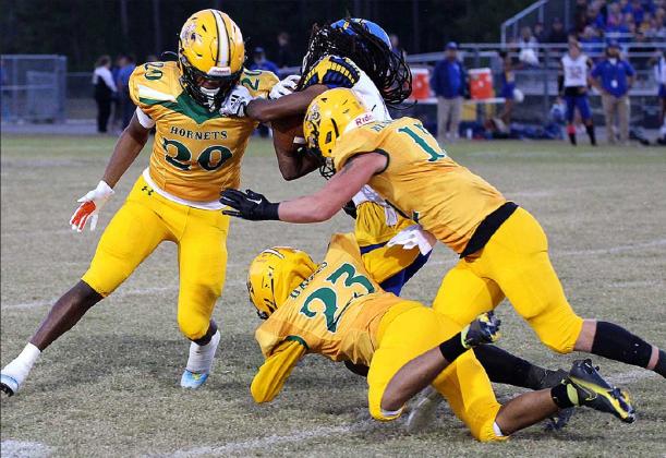 The Fernandina Beach and Yulee high schools’ football teams, pictured in action last season, kick off the 2023 season tonight with preseason Kickoff Classics at home. The FBHS Pirates host Hilliard, and the YHS Hornets are at home with Englewood. Kickoff is at 7 p.m. for both games. Photo by Beth Jones/News-Leader