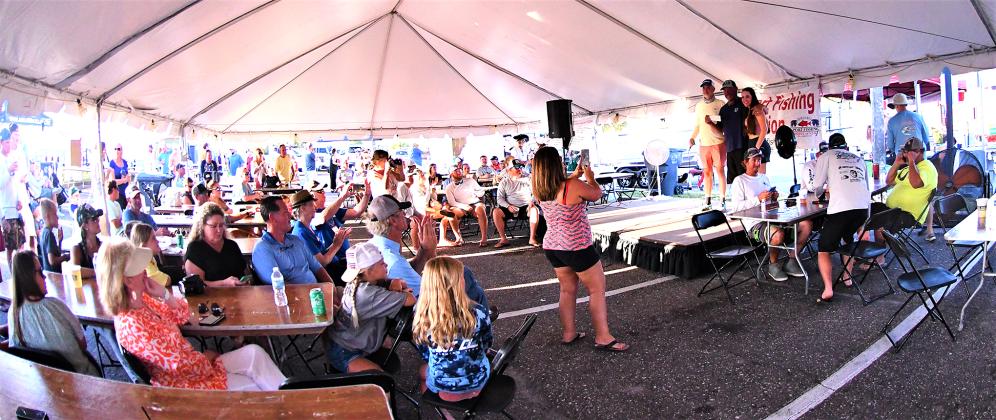 A big crowd gathered at the Fernandina Harbor Marina last year to enjoy the festivities, food and drinks and watch all the big fish being weighed in. Photo by Terry Lacoss/Special
