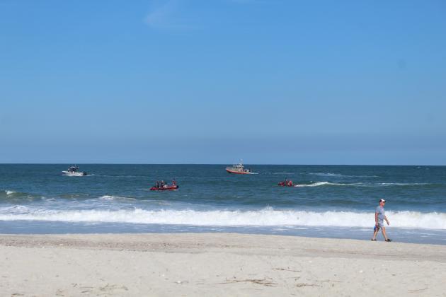 Agencies from Fernandina Beach and Nassau County were on scene near beach access No. 6 Wednesday, where two swimmers were rescued. Emergency responders could not find a third swimmer until Thursday afternoon. Photo by Julia Roberts/News-Leader