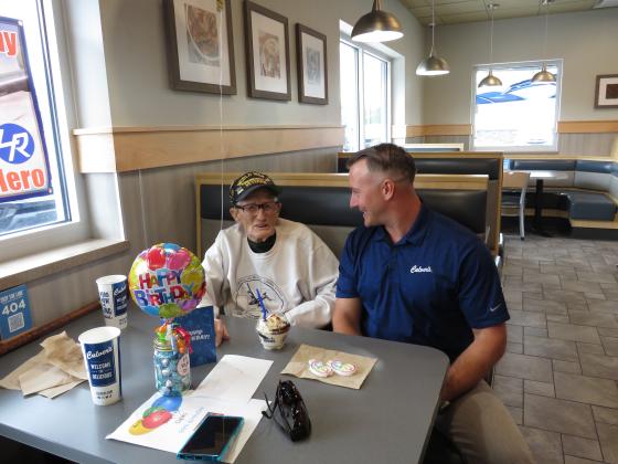 Culver’s Yulee owner Marty Greye wishing Dale Stickrath a happy 99th birthday. Photo by Sean Mathew Rosenthal/News-Leader