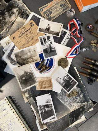 A collection of memorabilia Stickrath brought with him to his 99th birthday party at Culver’s. Photo by Sean Mathew Rosenthal/News-Leader