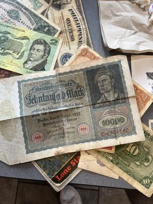 Stickrath’s collection of WWII era money he said soldiers who had been to opposite ends of the world would trade with each other. Photo by Sean Mathew Rosenthal/News-Leader