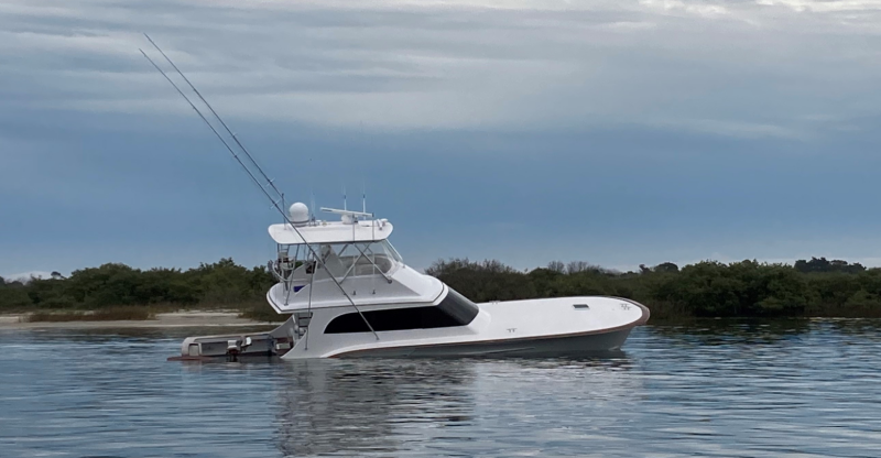 A 54-foot, $1.2 million boat sinks after a collision that killed an endangered North Atlantic right whale calf and severely injured its mother in 2021 near St. Augustine. Photos courtesy Florida Fish and Wildlife Conservation Commission