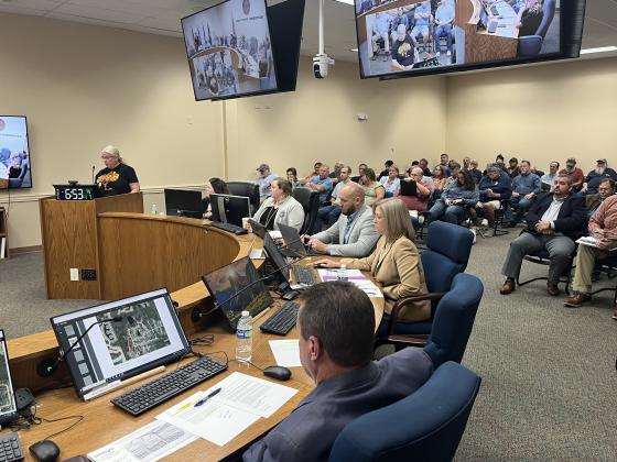 Concerned citizen Elizabeth Gilleland speaks in opposition to the rezoning of approximately 206 acres of Open Rural land to Residential. Photo by Sean Rosenthal/News-Leader