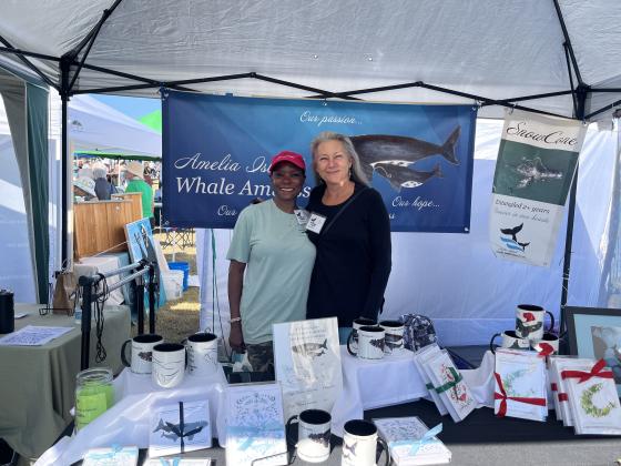 From left, Emme Devonish and Mary Roca, Amelia Island Right Whale Ambassadors. Photo by Sean Rosenthal