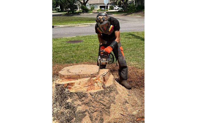 Jett Paxton in the beginning stages of a wood carving. Submitted photo