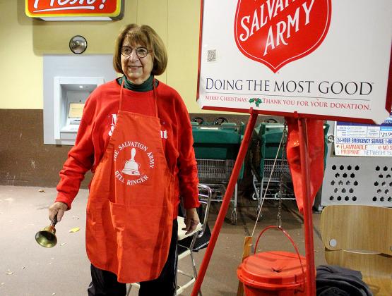 Pat Siberski rings the bell Wednesday outside Publix in Fernandina Beach.  Photo by Beth Jones/News-Leader