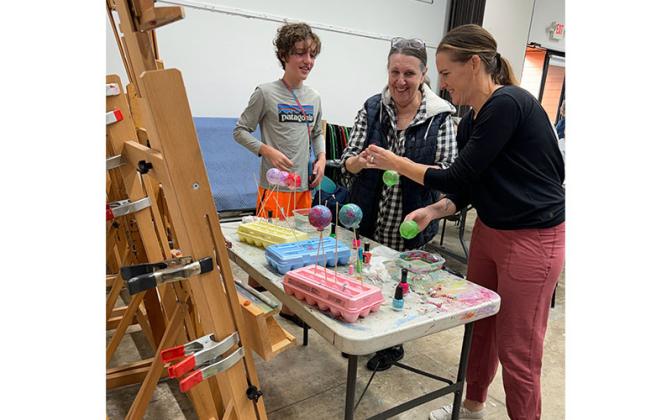 Students make Christmas decorations at the recent Sundays on Second program at the Island Art Association on Second Street. Submitted