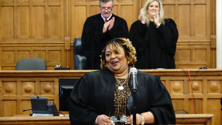 Deirdre A. Wallace spoke at her swearing-in ceremony to become the county’s first full-time magistrate as judges Lance Day and Jenny Higginbotham look on from the bench. Images Courtesy 4th Judicial Circuit