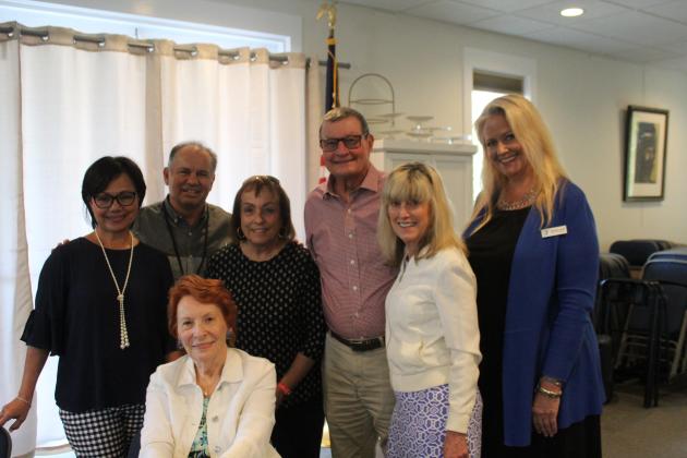 Betty Berkman, front, shared the love and success story between her and her late husband with YMCA executives and board members and why a sizable donation to the McArthur Family YMCA was important. Behind Berkman, from left, are Penny Zuber, executive vice president and CFO of First Coast YMCA; Cezar Gonzalez, YMCA district executive director; board members Barbara Gingher, Bob Tetu and Kay Stephenson; and Brooke Valet, First Coast YMCA director of development. Photo by Tracy Dishman/News-Leader