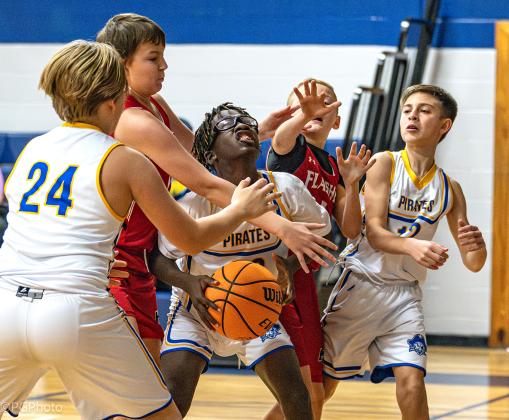 Middle school junior varsity boys hoops tourney held. Photos by Penny Glackin/News-Leader