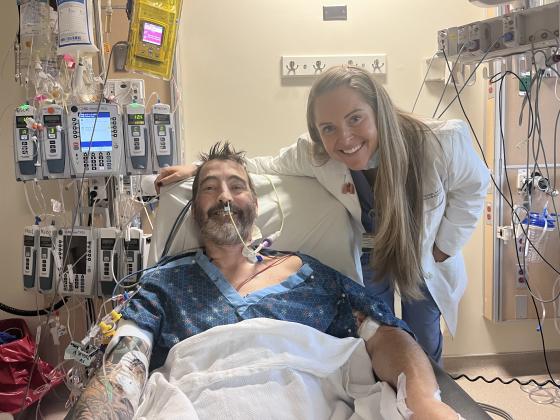 Mike Boston a few days after double lung transplant surgery with the surgeon who performed his transplants, Dr. Caitlin Demarest, M.D., Ph.D., Department of Thoracic Surgery. Photos courtesy of Boston Photography