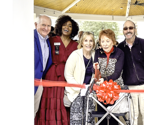Betty Berkman cuts the commemorative ribbon and officially dedicates the Berkman Pavilion and Memorial Garden. Joining Berkman, from left, are board member and project manager Tim Eberle, President and CEO Janice Ancrum, Sherry Berkman Jennings and Steven Berkman. Photo by Stan Cottle, Cottle Communications
