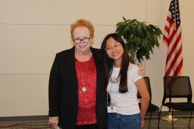 Fernandina Beach Optimist Club Vice President Jacquelin Osborne stands with spelling bee winner Cathy Le. Submitted