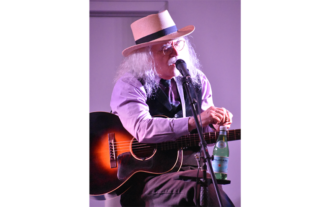 Before Hiaasen, the program welcomed storyteller, songwriter and singer Michael Reno Harrell, who has performed for audiences across the U.S. and in other countries over a 50-year career.  Photo by Andy Diffenderfer/CNI Newspapers
