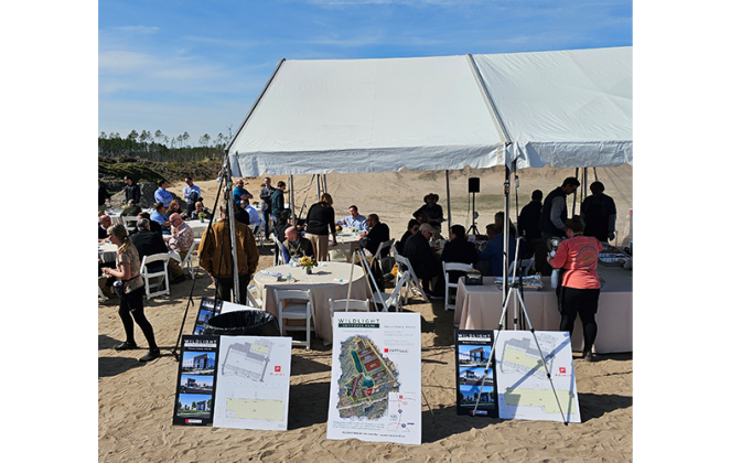 The opening of Wildlight Commerce Park was recently announced with a gathering of real estate and economic development officials. Photo by Foy Maloy/News-Leader