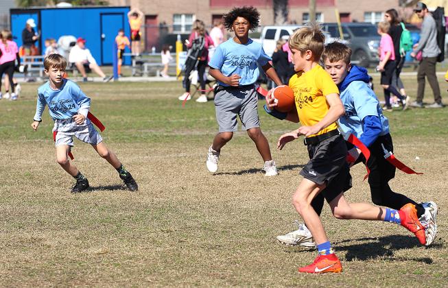 Opening day for flag football. Photo by Beth Jones/News-Leader