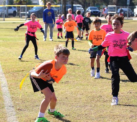 Opening day for flag football. Photo by Beth Jones/News-Leader