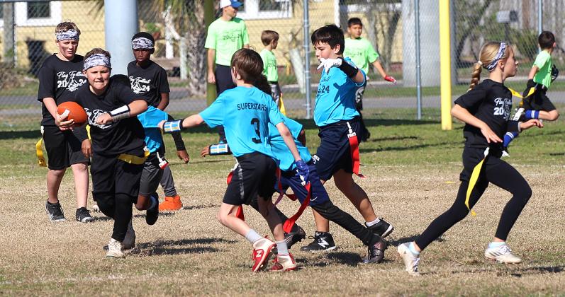 Opening day for flag football. Photo by Beth Jones/News-Leader