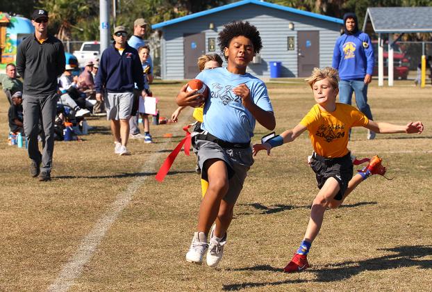 Opening day for flag football. Photo by Beth Jones/News-Leader