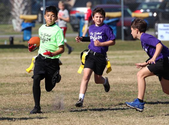 Opening day for flag football. Photo by Beth Jones/News-Leader