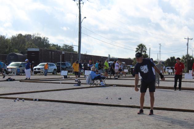 The Amelia Island Boules Club hosts the Petanque Amelia Island Open Tournament, the largest pétanque event in the Americas, each November, bringing hundreds of players from all over the world to Fernandina Beach. Petanque courts on the Amelia River waterfront in Fernandina Beach are under attack, as some residents say they should not be permanent in a riverfront park, and should only be played at the park during the tournament. File photo