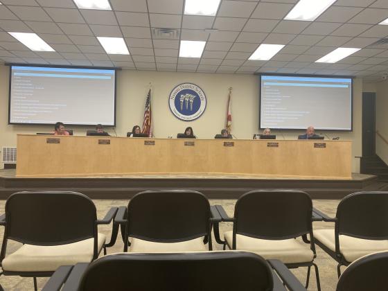 The Nassau County School Board, from left, Superintendent Kathy Burns, attorney Brett Steger, board member Shannon Hogue, board chairperson Cindy Grooms, board vice chairperson Gail Cook, board member Lissa Braddock and board member Curtis Gaus during discussions at the Feb. 22 school board meeting. Photo by Tracy McCormick-Dishman/News-Leader