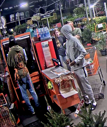 Surveillance video of a Home Depot robbery identified the suspect as Raheem Davis Jr. Submitted