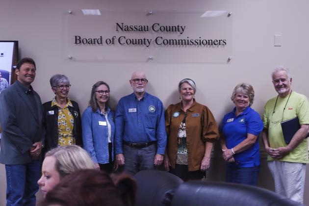 Members of The Bartram Garden Club pose with Commissioner Jeff Gray after the proclamation of William Bartram Month April 8 at the Nassau County Commissioners meeting. From left are Gray, Linda Martin, Beverly Williams, Marc Williams, Karen Reily, Pam Dawson and Jerry Walthall. Photo by Ashley Chandler