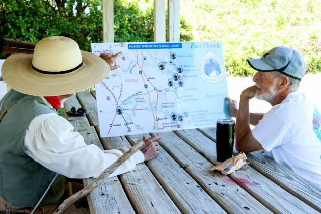 Billy Bartram talks to Rich Riley ahead of the Interpretive Talk held Saturday at Egans Creek Park. Photo by Ashley Chandler