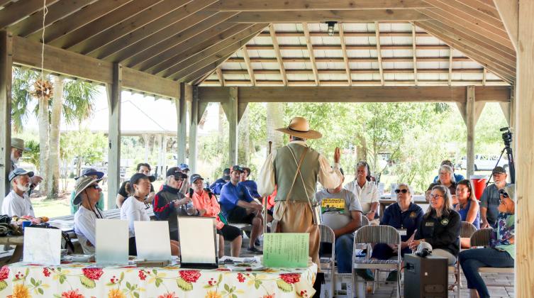 William “Billy” Bartram talks to the audience during the Interpretive Talk held Saturday at Egans Creek Park. Photo by Ashley Chandler