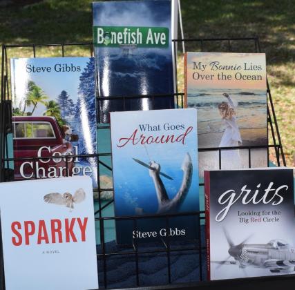 Books by the author of original books and two series, Steve Gibbs, available on Saturday. Photo by Judie Mackie/For the News-Leader