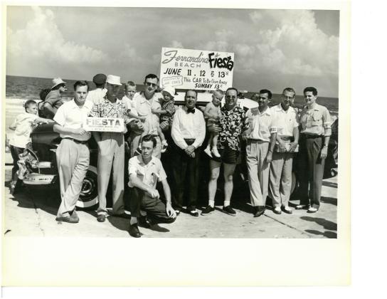 The Mayor of Fernandina Beach, center in bow tie, poses with others in attendance at the Fernandina Fiesta in 1956. The Fiesta is the precursor to the Shrimp Festival. Finalists in the 1956 Fernandina Beach beauty contest pose on the beach. Photo courtesy of Amelia Island Museum of History