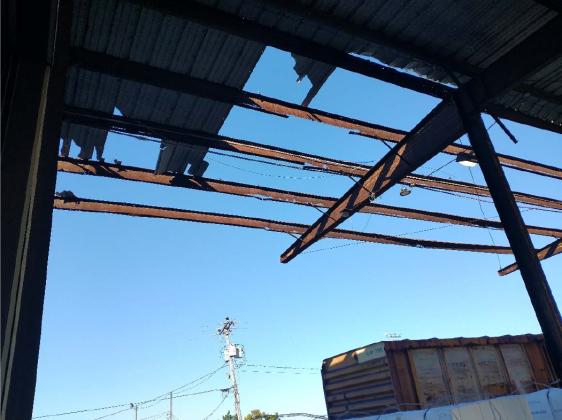 The roof on a truck dock at the port was damaged in a story, and did not keep the dock from becoming slick when it rained.  Photos courtesy of Electrical Contractors Inc. and R&amp;M Engineering Consultants