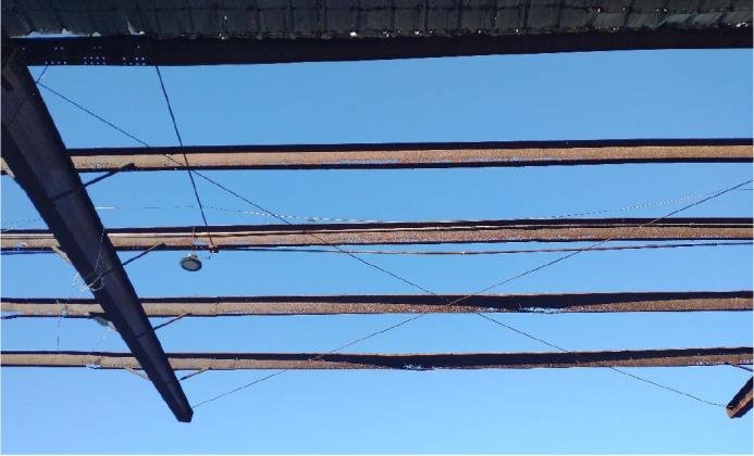 The roof on a truck dock at the port was damaged in a story, and did not keep the dock from becoming slick when it rained. Photos courtesy of Electrical Contractors Inc. and R&amp;M Engineering Consultants