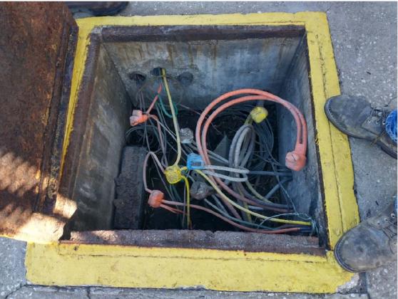 According to a report from Electrical Constractors, several underground electrical boxes at the Port of Fernandina are in areas which flood regularly. Underground boxes are common even in wet areas, but any splices should be made with devices that are water resistant and listed for wet areas, the report recommended. Photos courtesy of Electrical Contractors Inc. and R&M Engineering Consultants