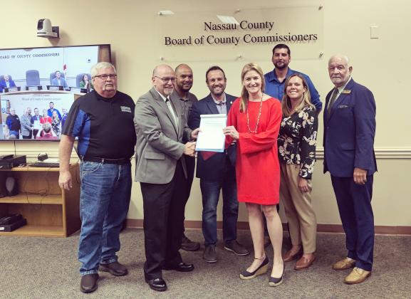 Chairman John Martin poses with representatives from Ocean, Highway &amp; Port Authority who were in attendance to receive a proclamation declaring May 22 as National Maritime Day in Nassau County. Photo by Ashley Chandler/News-Leader
