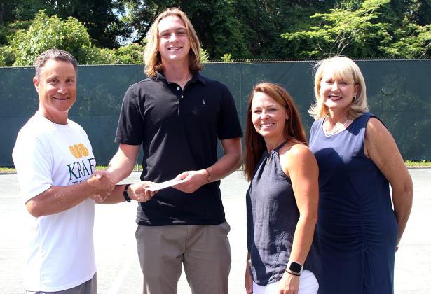 Colwell is pictured with Rudolph and scholarship committee members B. Thomas and J. Menz. Submitted