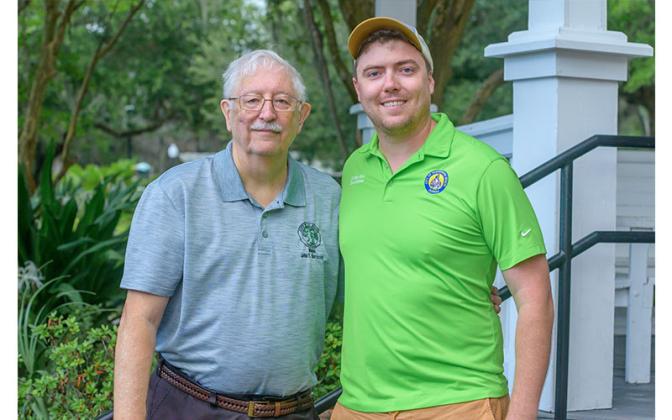 Fernandina Beach Mayor Bradley Bean poses with St. Marys Mayor John F. Morrissey on Saturday at the Cross the Line Paddle for Veterans event. Photos by Mariah Lovin/The Barefoot Photographer