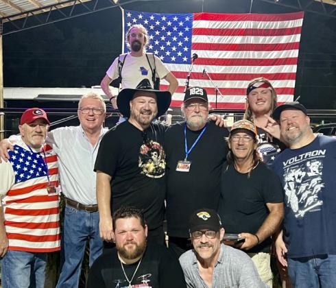 Rodney Mills poses with members of the musical groups that performed at The Light Up The Sky Independence Day Celebration and some of the coordinators. From left: Gearald McSwain, Paul Schwend, Shawn Copher, Rodney Mills, Dewain Miller, Tom Bennett and Colby Word; bottom from left: Gary Kreiser and Chuck Pederson; top: Conor Harrison. Submitted photo