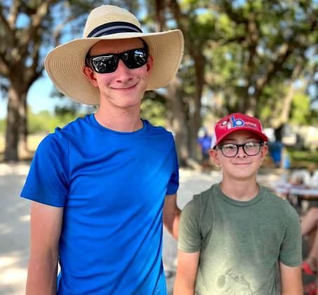 Elijah Mullican, 15, and Caleb Mullican, 12. Photo by Beth Jones/News-Leader