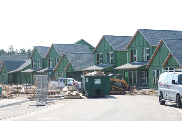 Construction continues on homes in Hamlet at Wildlight in May. Wildlight recently announced yet another neighborhood to go up soon — Westerly Park. The new residential area will include townhomes and duplexes.  Photo by Ashley Chandler/News-Leader