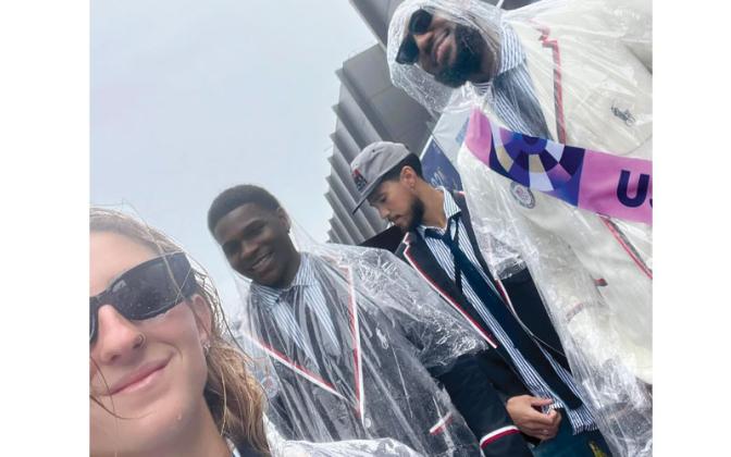 From left: Olympian Poe Pinson with NBA players Anthony Edwards, Jason Taytum and LeBron James at the 2024 Paris Olympics. Submitted photo