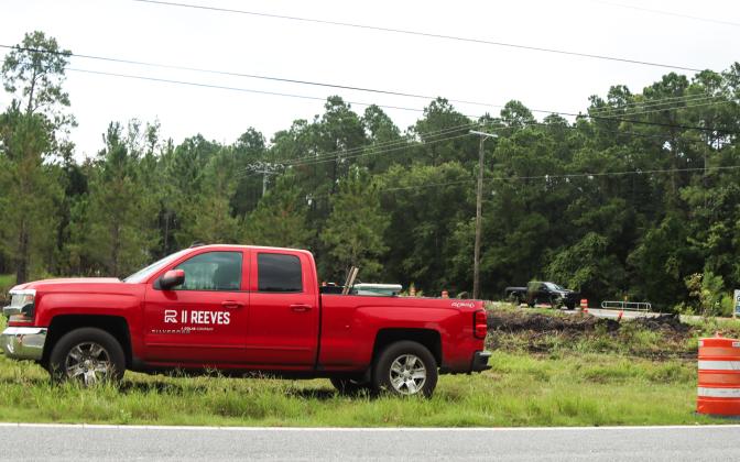 A Reeve's Construction pickup is parked near the Chester Road and Pages Dairy Intersection on a stormy August day. The portion of Chester Road expected to be closed yesterday, has been postponed due to the anticipation of heavy rains this week. The railroad reconstruction is expected to commence Sept. 19 for about five days. Ashley Chandler/News-Leader