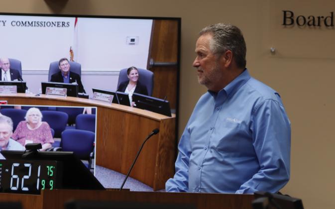 Gil Langley, president and CEO of the Amelia Island Convention &amp; Visitors Bureau speaks Monday at the Nassau County Board of County Commissioners meeting about the CVB’s showing at the Flagler Awards. The CVB brought home six awards including four Henry’s. Ashley Chandler/News-Leader