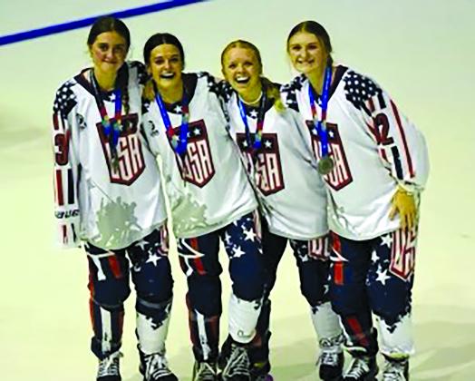 Matz with her teammates and their silver medals. Submitted photo