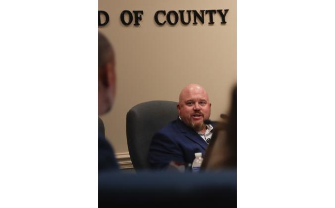 Commissioner Klynt Farmer speaks Monday at the Nassau County Board of County Commissioners meeting. Farmer said the new 48–foot Coastal Fast Response Boat Fire Rescue vessel, that the county accepted a grant to buy, will fill a gap in the county that has been there for years. Photos by Ashley Chandler/New-Leader