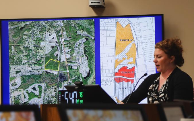 Casey Dendor, planner at England Thims &amp; Miller, Inc. gives the applicant’s presentation during a Quasi-Judicial Public Hearing on Monday at the Nassau County Board of County Commissioners meeting. The graphic behind her shows Parcel B. The Final Development Plan approved at the hearing was for Nassau Crossing Planned Unit Development Parcel B.  Photos by Ashley Chandler/News-Leader