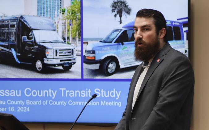 Director of Planning and Sustainability for Jacksonville Transportation Authority, Alexander Traversa, gives a presentation on the Nassau County Transit Study 2024 Update on Oct. 16 at the Board of County Commissioners meeting. Photo by Ashley Chandler/News-Leader