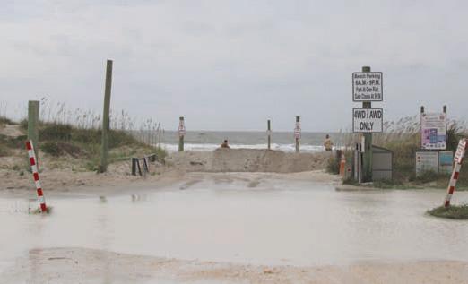 The beach access at Seaside Park, at the intersection of South Fletcher Avenue and Sadler Road, was closed to traffic, and a dune erected to protect from storm surge. Julia Roberts/News-Leader